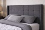 Padded upholstered headboard with stitched panels on Aven bed set
