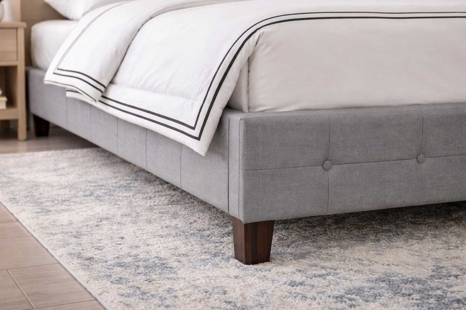 Bonde bed set upholstered frame and wooden leg detail