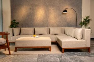 Trevalis sofa set with beige upholstery and L-shaped sectional design