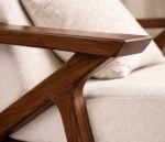 Solid wood armrest and frame detailing on Caldera sofa chair