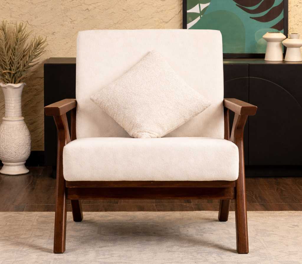 Modern lounge setting featuring Caldera sofa chair and wood accents