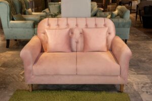 Veltrano sofa set with blush pink upholstery and tufted backrest design