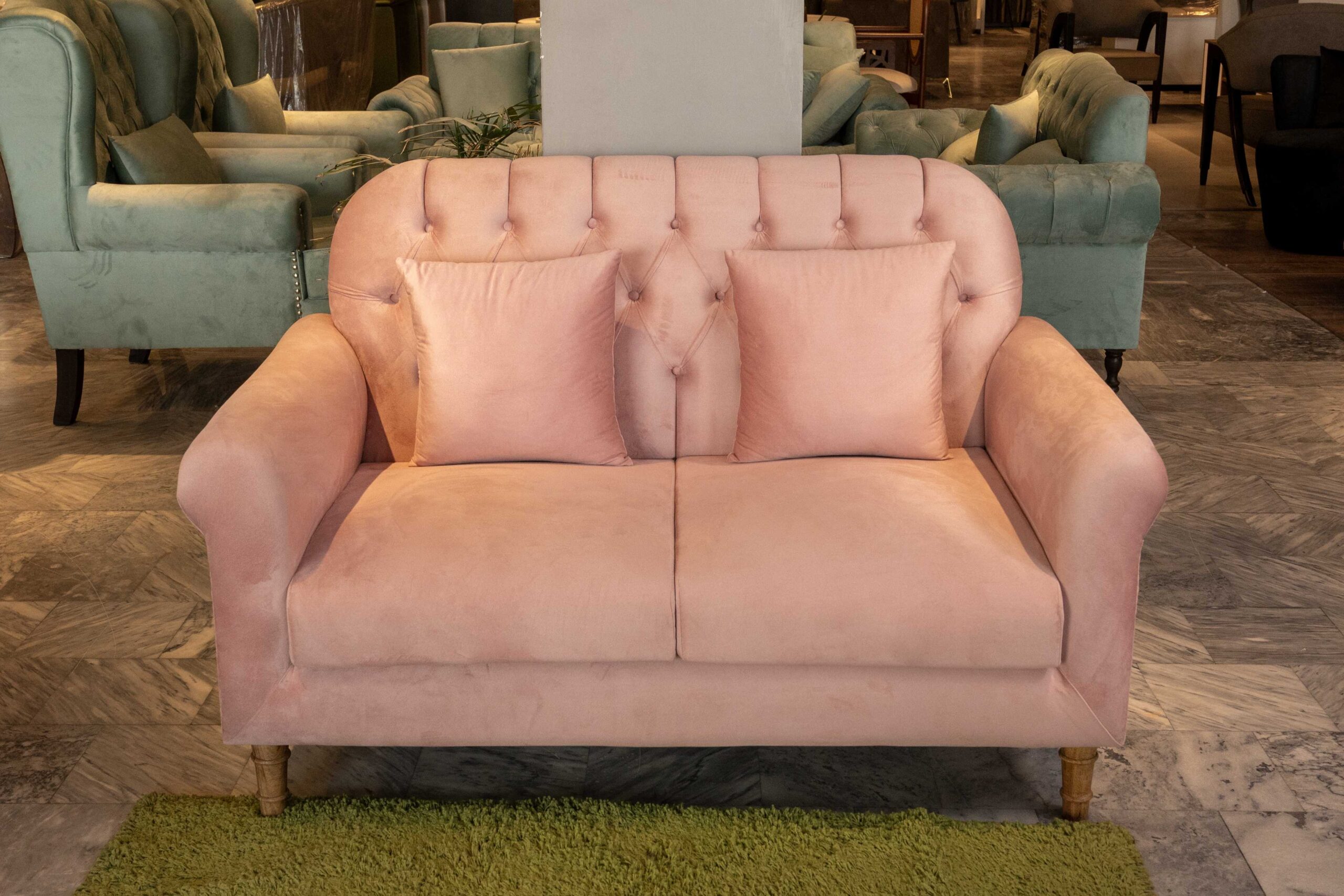 Veltrano sofa set with blush pink upholstery and tufted backrest design
