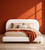 Modern white boucle upholstered bed with a rounded headboard by Renome