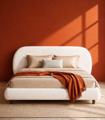 Modern white boucle upholstered bed with a rounded headboard by Renome