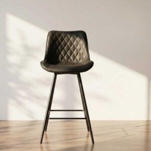Zenith Black leather stool with diamond quilted pattern and metal kegs by renome