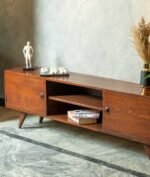 Mid-century modern wooden TV console with tapered legs and open shelving in a minimalist living room by Renome