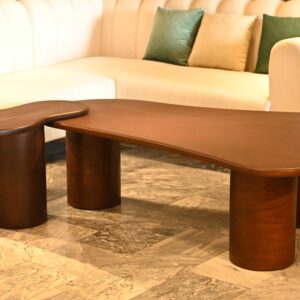 Transform your lounge with the Zen Curve coffee table by Renome. An organic wood center table featuring a unique amoeba shape and bold minimalist design
