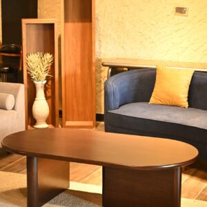 Modern elliptic oval wood center table with thick architectural slab legs by Renome