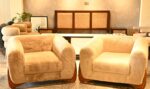 Modern single-seater Sherpa cloud sofa with plush cream faux fur and a bold rounded design by Renome