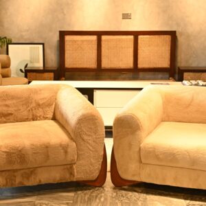 Modern single-seater Sherpa cloud sofa with plush cream faux fur and a bold rounded design by Renome