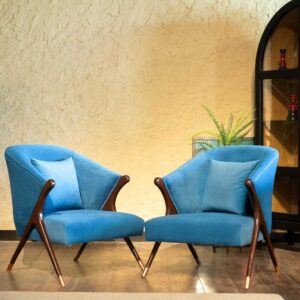 azure velvet accent chair with curved backrest and mid-century modern wooden frame by Renome